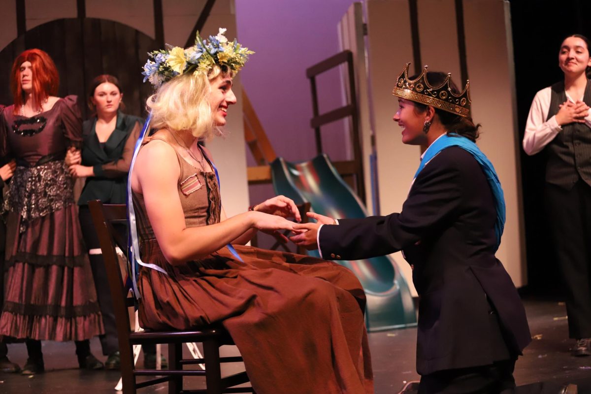 (Left to right) Sam White as Cinderella and Lia Verrico as Prince Charming in the dress rehearsal for "Cinderella."
Photo: Chelsea Cole, Miramonte Yearbook