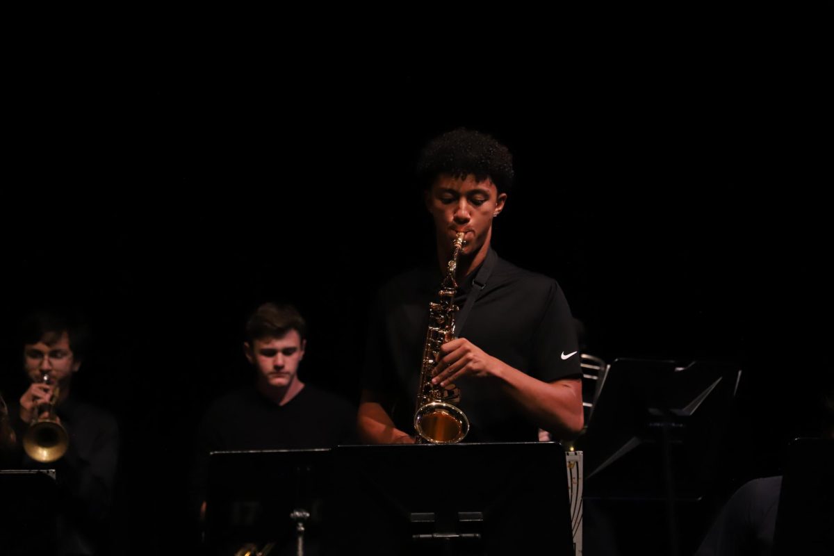 Junior Charles Ritchenburg performs a solo for jazz band. Photos: Parker Hjortsvang